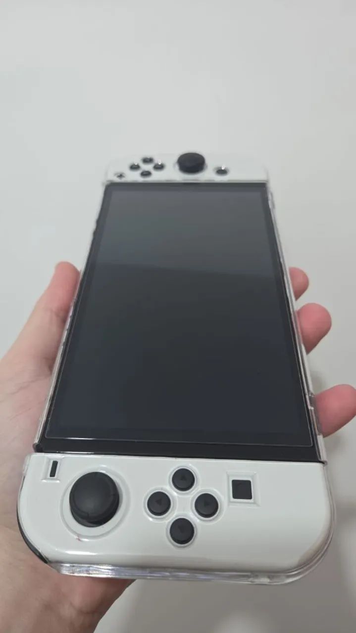 NINTENDO  SWITCH OLED ( BASICAMENTE  NOVO)