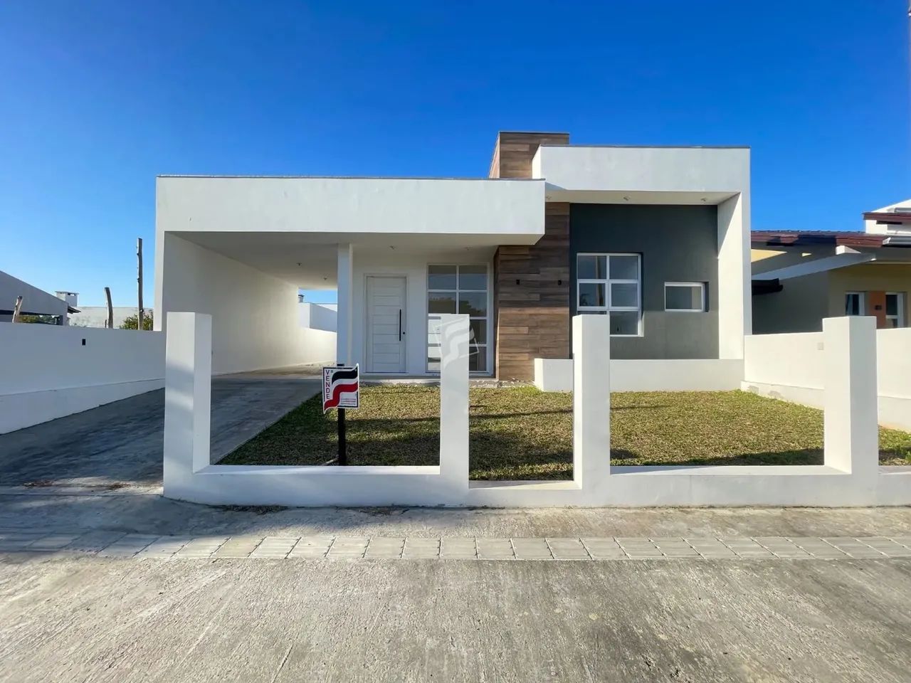 Localizada em um dos bairros mais tranquilos de Passo de Torres, a casa em Bellatorres é o