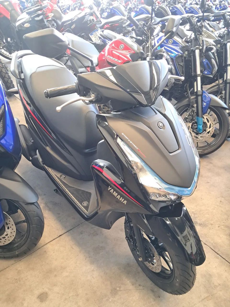 FLUO 125 HÍBRIDA 2026