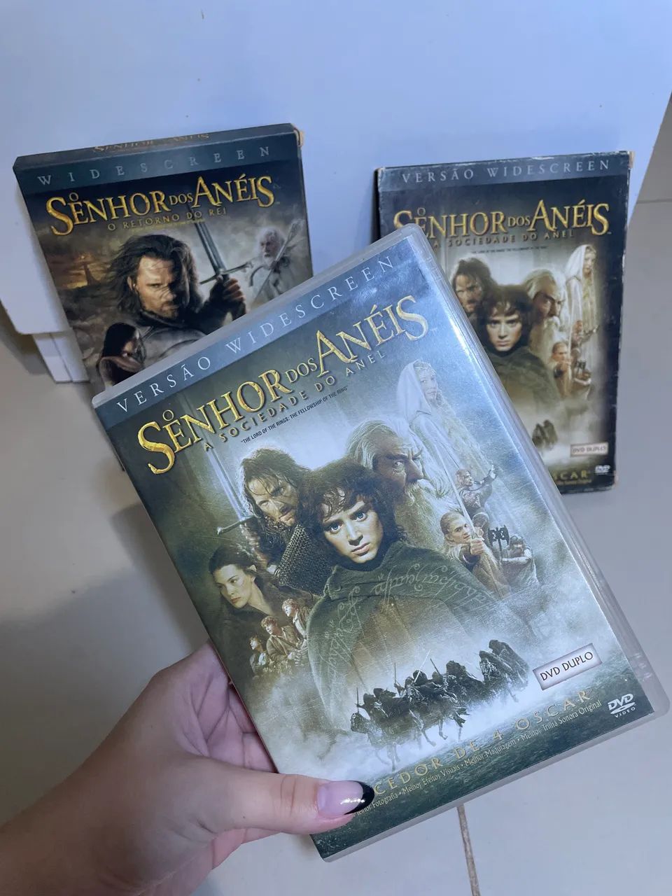 DVD O Senhor dos Anéis (Sociedade do Anel + Retorno do Rei) Originais - Clássicos - Foto 2