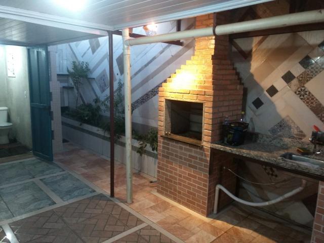 Casa QR 518 Santa Maria, 2 qts, cerâmica, forrada em pvc, churrasqueira, floreira!
