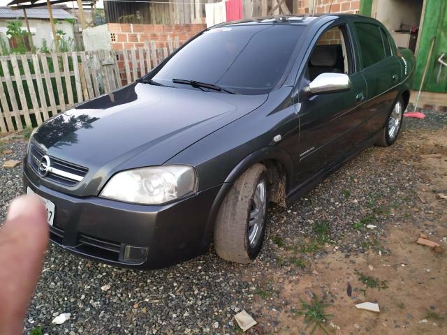 Astra sedan .automático. completo .troco por carro 1.0 ou 14 pré.sedan