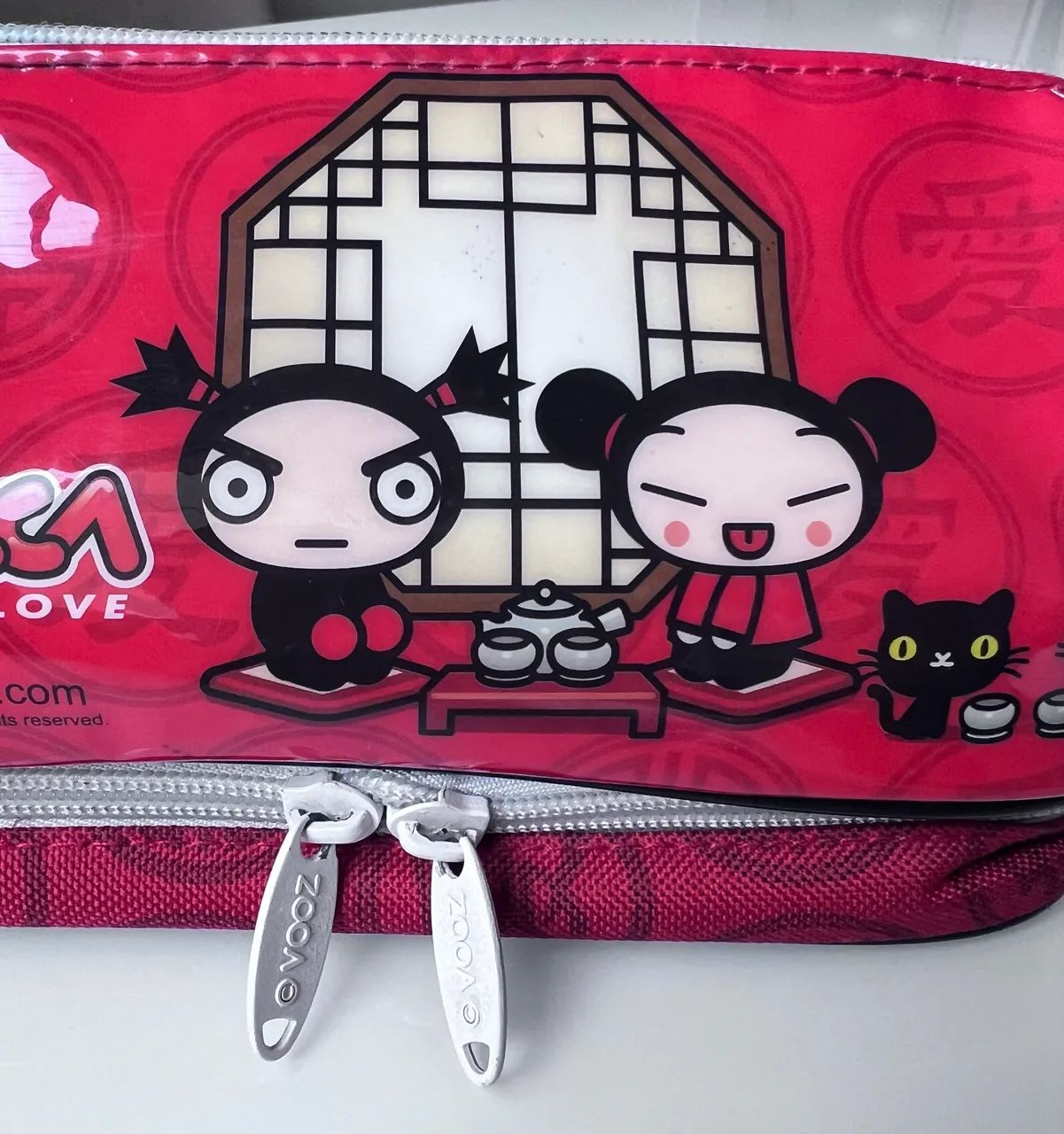 Estojo Pucca + kit escolar  - Foto 4