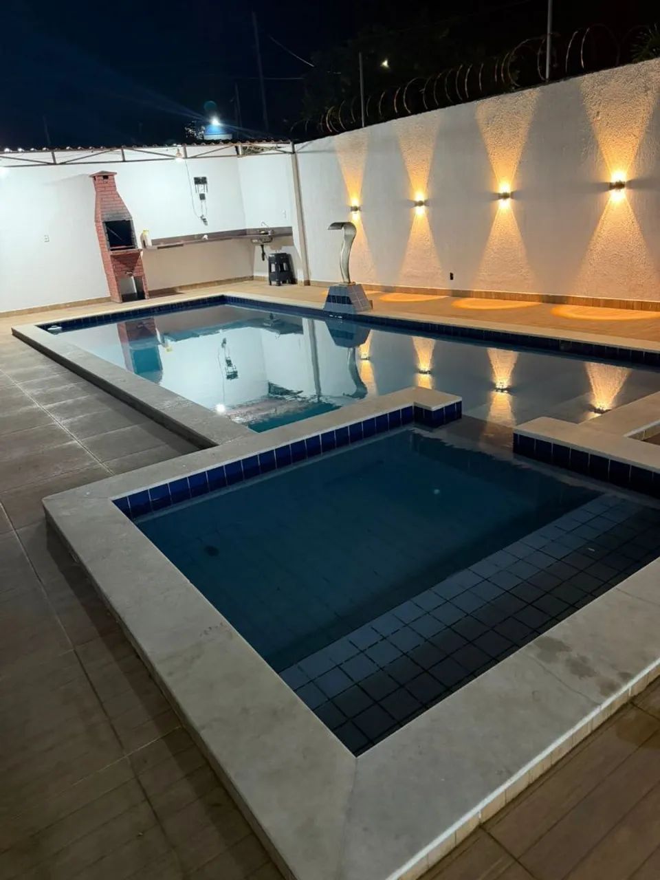 Salão de festas com piscina 