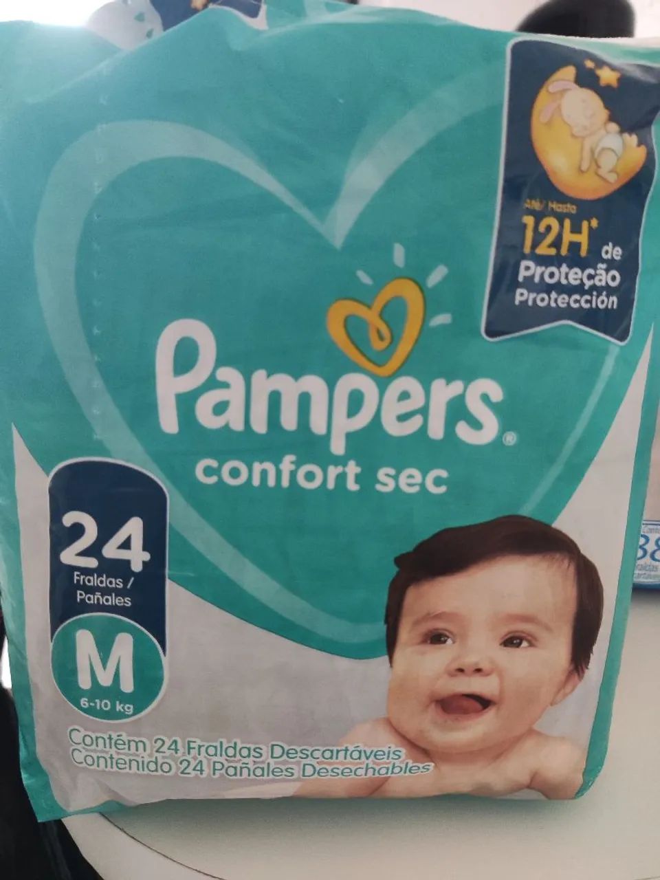 Fralda Pampers confort Sec M