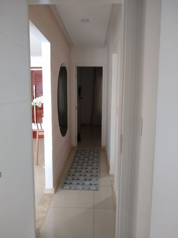 Casa em condomínio fechado, 3/4 um suíte c closet, piscina, área gourmet - Foto 4