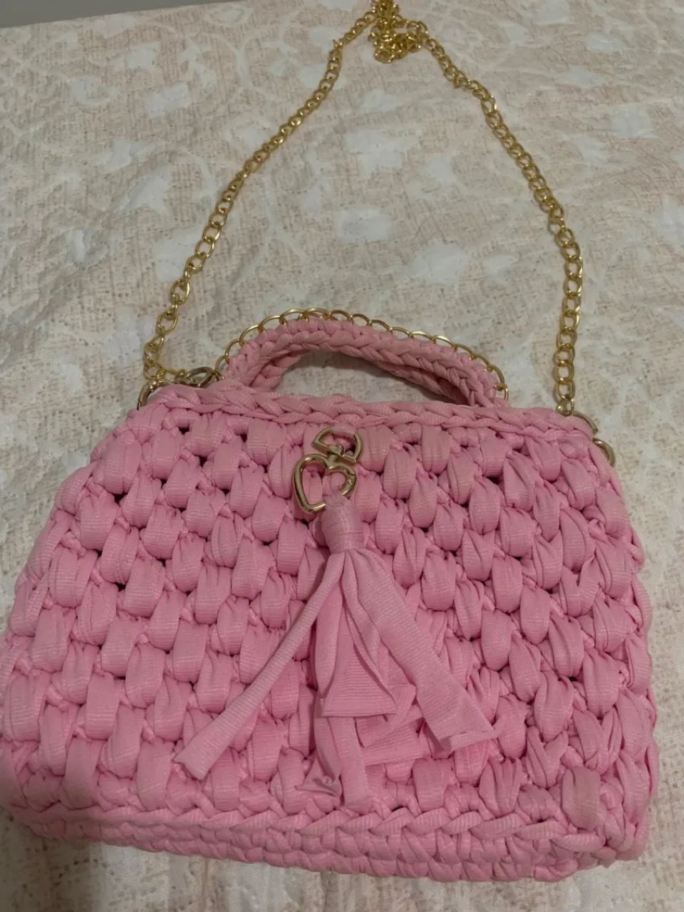 Bolsa de mão rosa artesanal