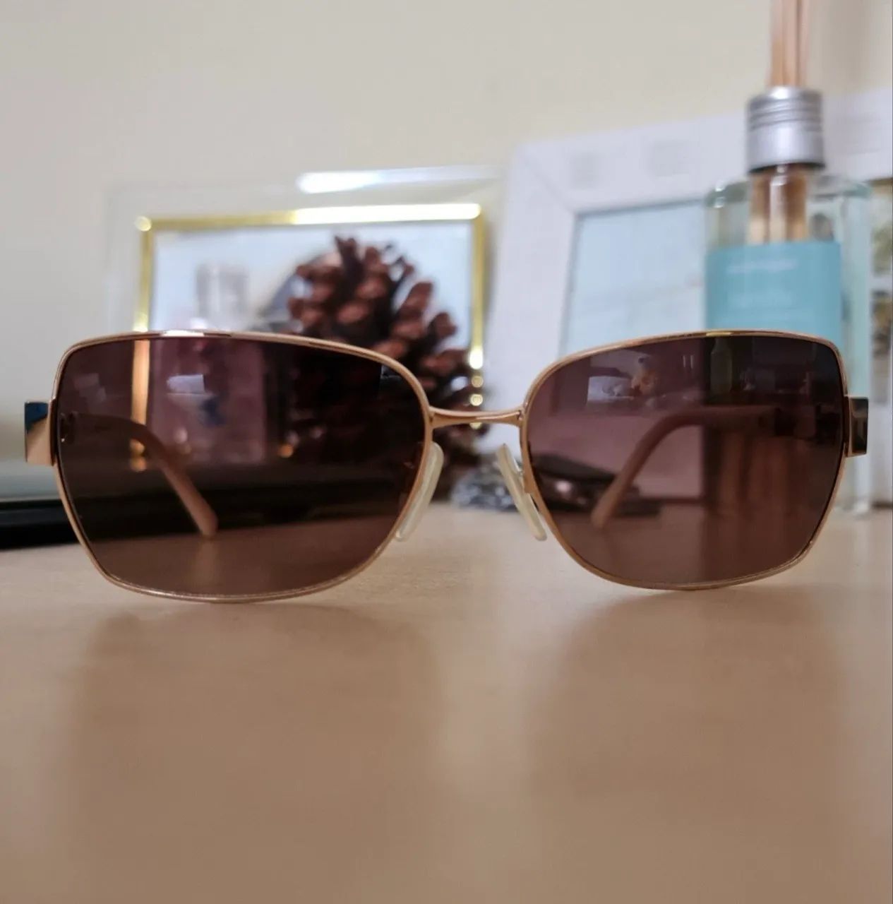 Óculos de sol Ana Hickmann eyewear marrom e dourando - Foto 5