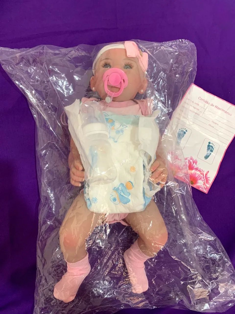 Bebê reborn + acessórios 