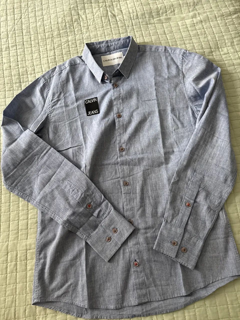 Bermudas número 40 e uma camisa  - Foto 3