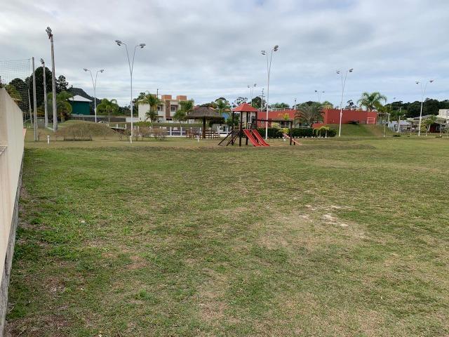Terreno com escritura pode financiar em condomínio área de lazer completa - Foto 6