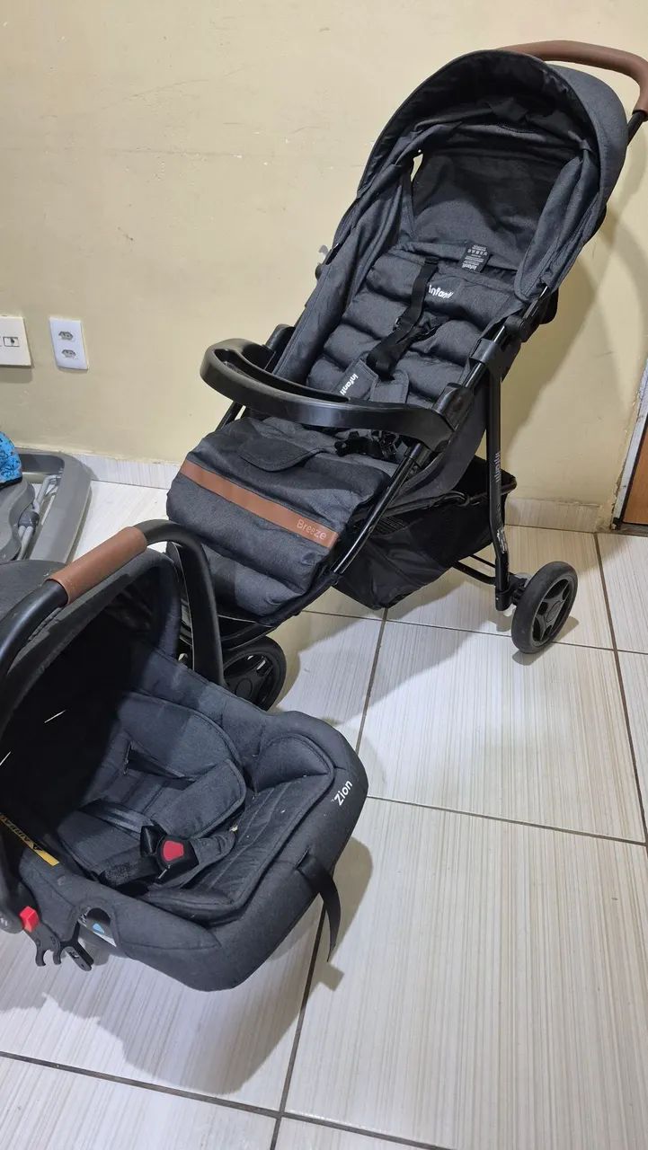 Conjunto carrinho e bebê conforto.