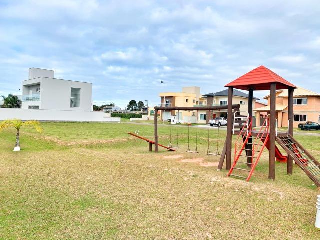 Terreno com escritura pode financiar em condomínio área de lazer completa - Foto 9