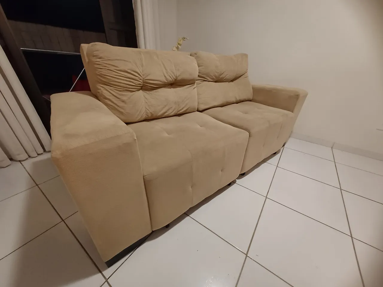 Sofá Retrátil em ótimo estado. Retirada no local.