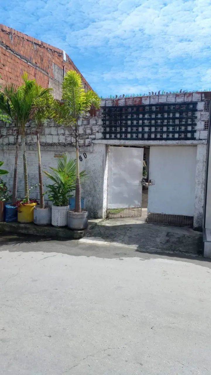 Terreno com casa
