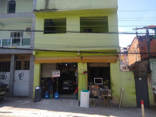 Vendo casa com loja e garagem