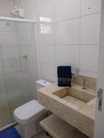 Casa em condomínio fechado, 3/4 um suíte c closet, piscina, área gourmet - Foto 8