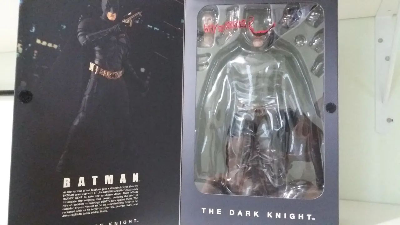Batman e Joker da trilogia