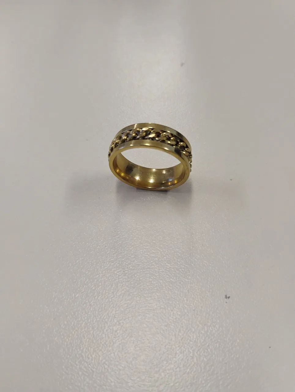 Anel em aço dourado anti-stress