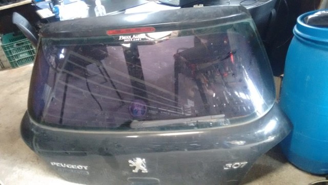 Tampa traseira Peugeot 307 com vidro.