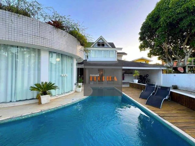 Espetacular casa no Rio Tavares com 5 suítes a poucos metros da praia