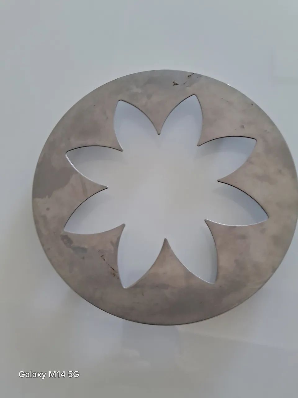 Peça decorativa em metal