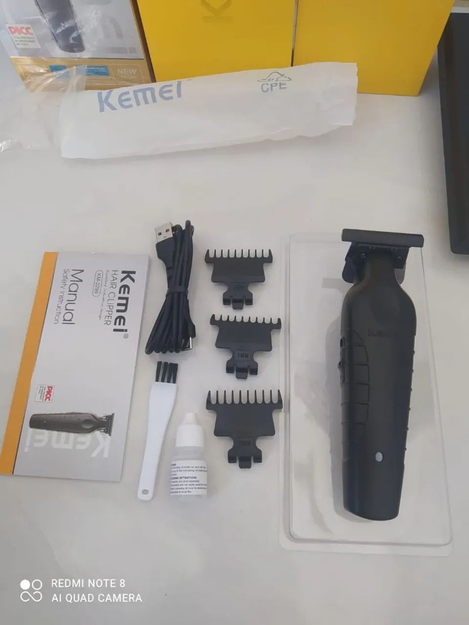 Máquina de cortar cabelo acabamento kemei  - Foto 5