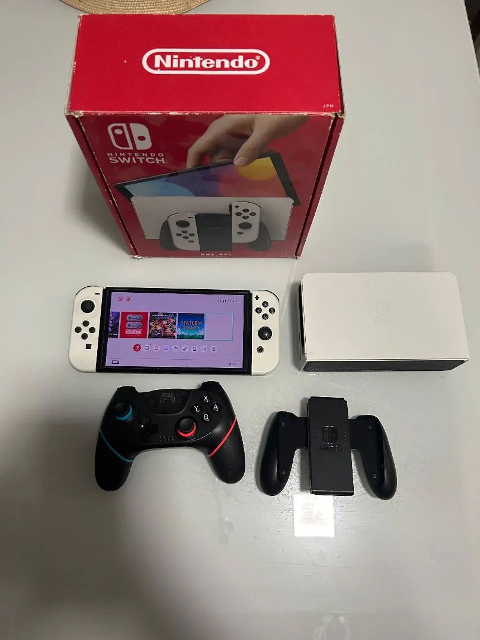 Nintendo Switch OLED 64 GB, completo e Bloqueado. 