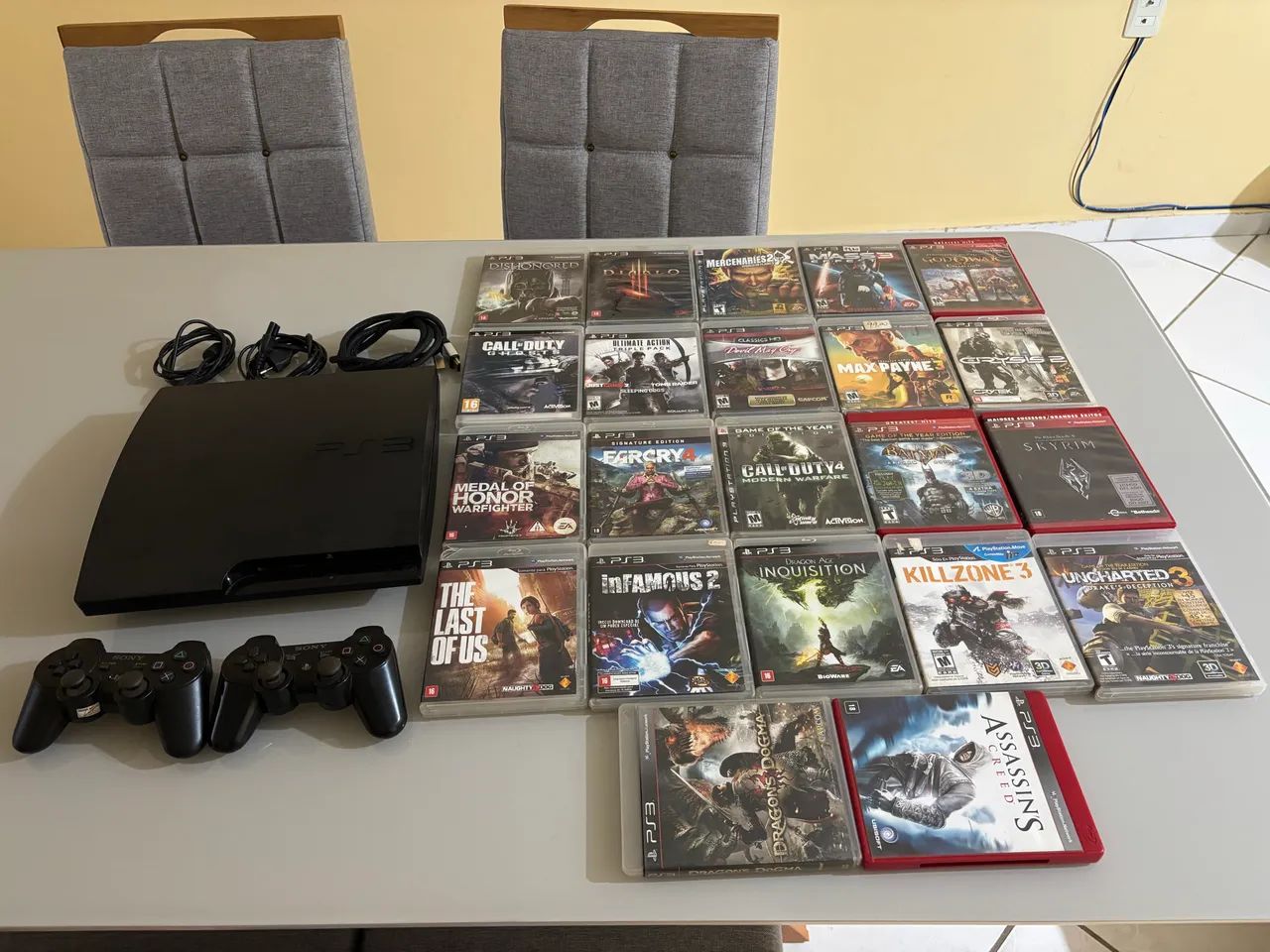PS3 com 20 jogos 