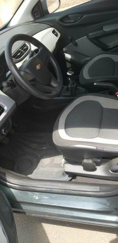 Onix Ls flex ano 2016 1.0 com ar condicionado e direção hidráulica com 54000km - Foto 8