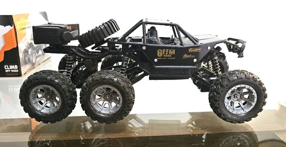 Carrinho de Controle Remoto a Bateria Recarregável 3 Eixos Tipo Jeep 4x4