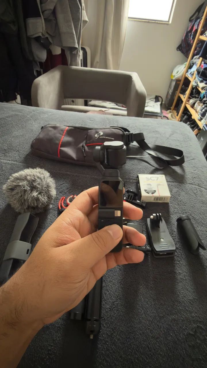 Câmera DJI osmo pocket ll + kit microfone Rode  e tripé  - Foto 4