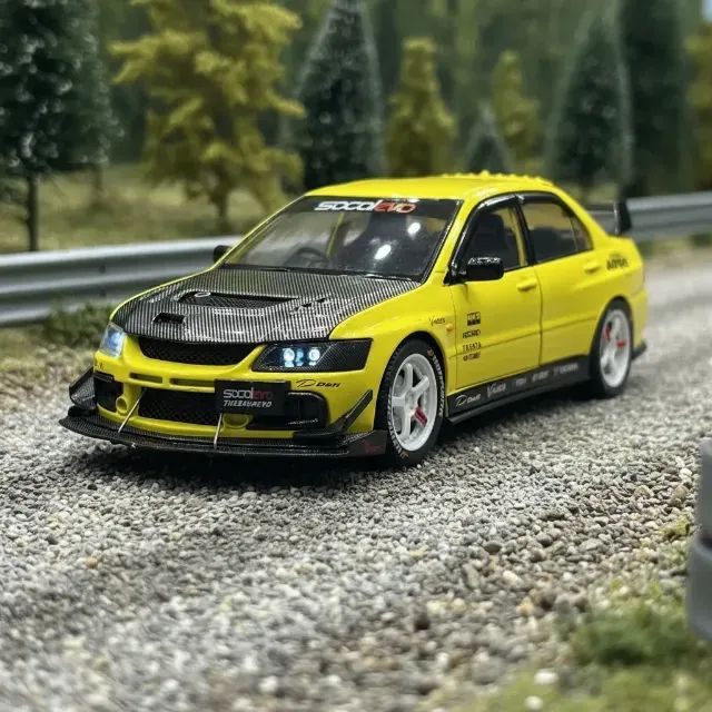 Miniatura Mitsubishi Lancer Evolution IX 1:24 amarelo - som e luz - Foto 4