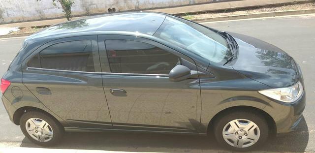 Onix Ls flex ano 2016 1.0 com ar condicionado e direção hidráulica com 54000km - Foto 6