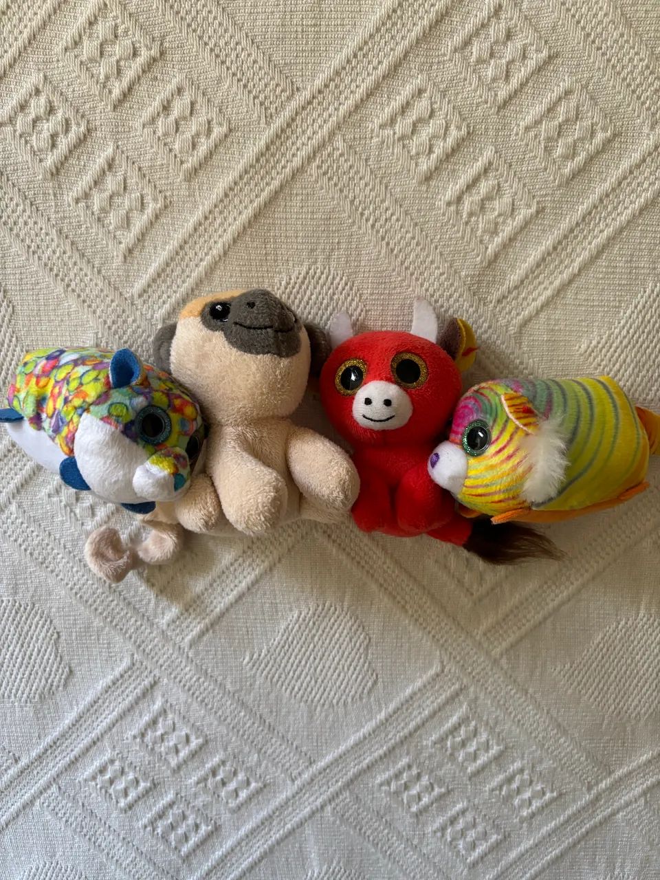 quatro mini pelúcias
