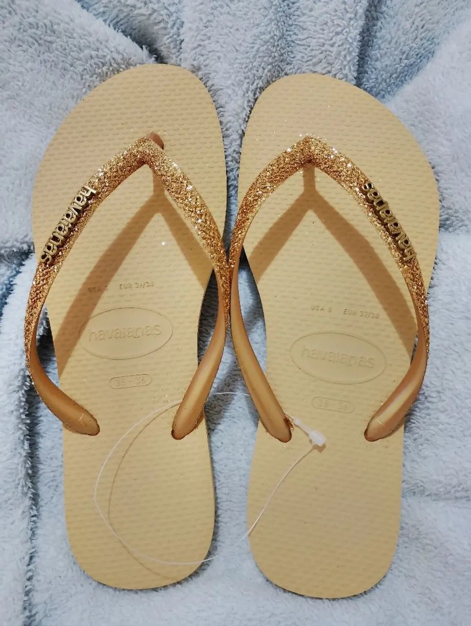 Chinelo havaiana dourado glitter 