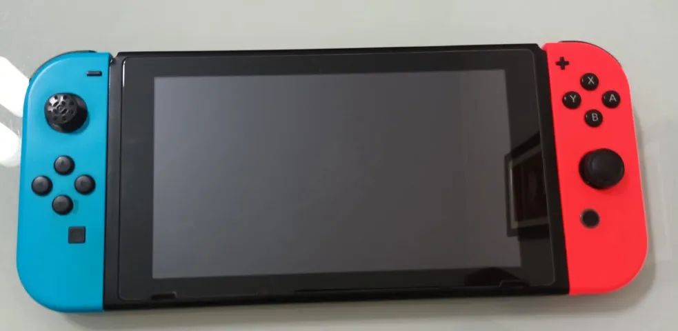 Nintendo Switch + Acessórios + Jogo - Foto 4