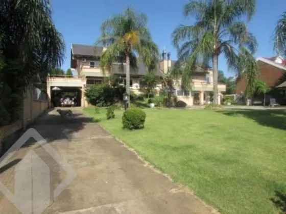 Casa residencial à venda com 1150 m² e 7 dormitórios/quartos no bairro Ilha da Pintada