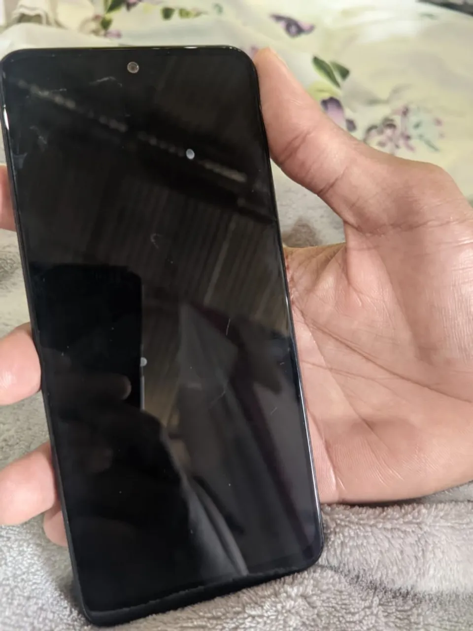 Celular xiaomi redimi note 12 usado sem marcas tudo funcionando perfeitamente nunca aberto