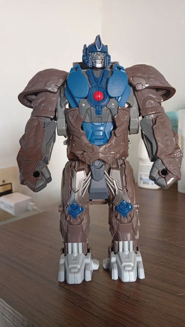 Boneco Transformers Optimus Primal