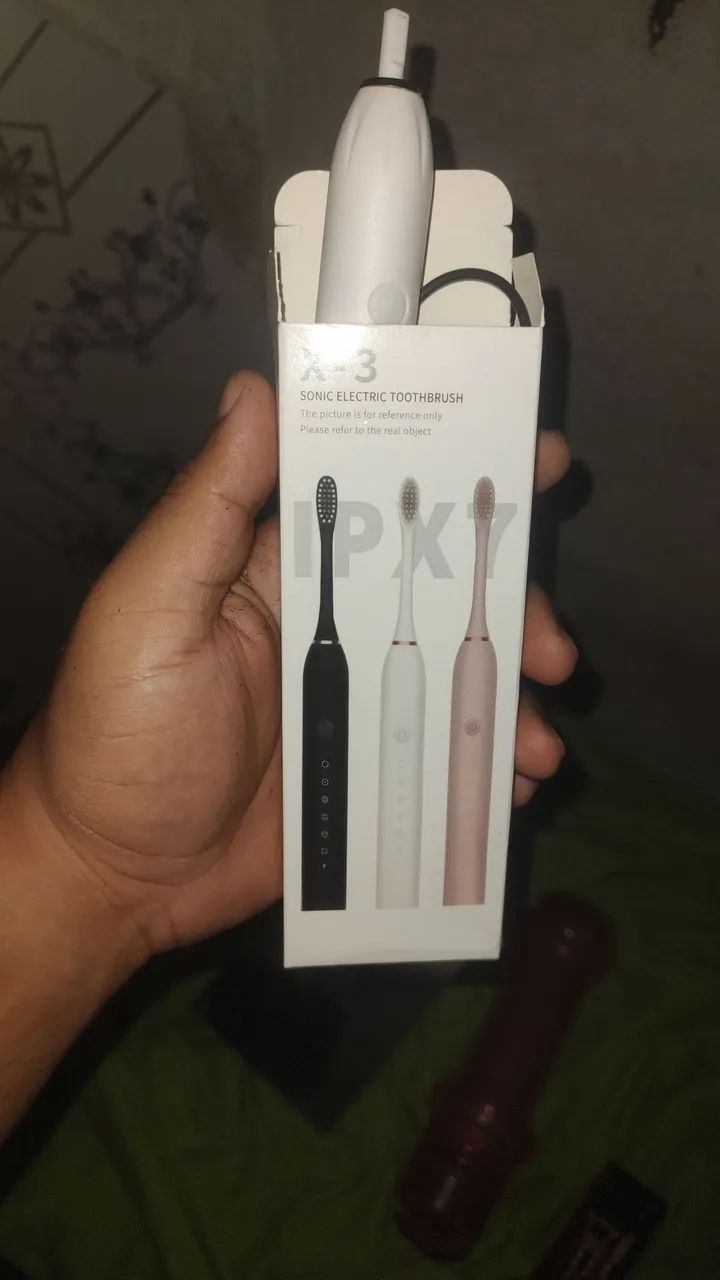 Escova de dente elétrica 