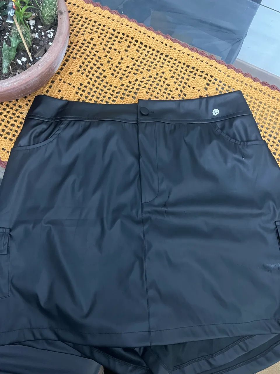 Short saia couro 