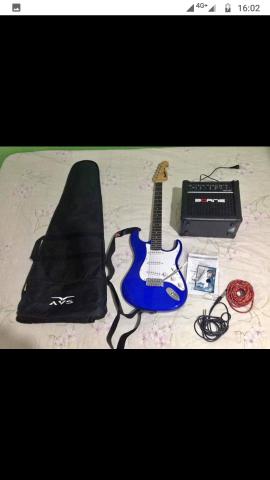 Guitarra memphis Mg-32 bl e amplificador
