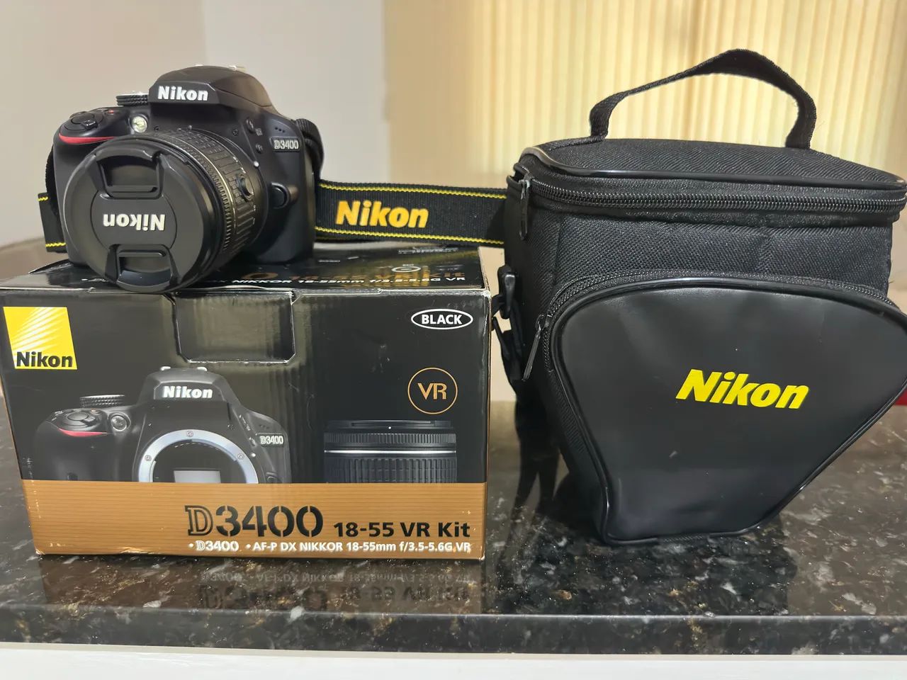 Câmera Nikon D3400 NA CAIXA com lente e acessórios + BRINDE - Foto 4