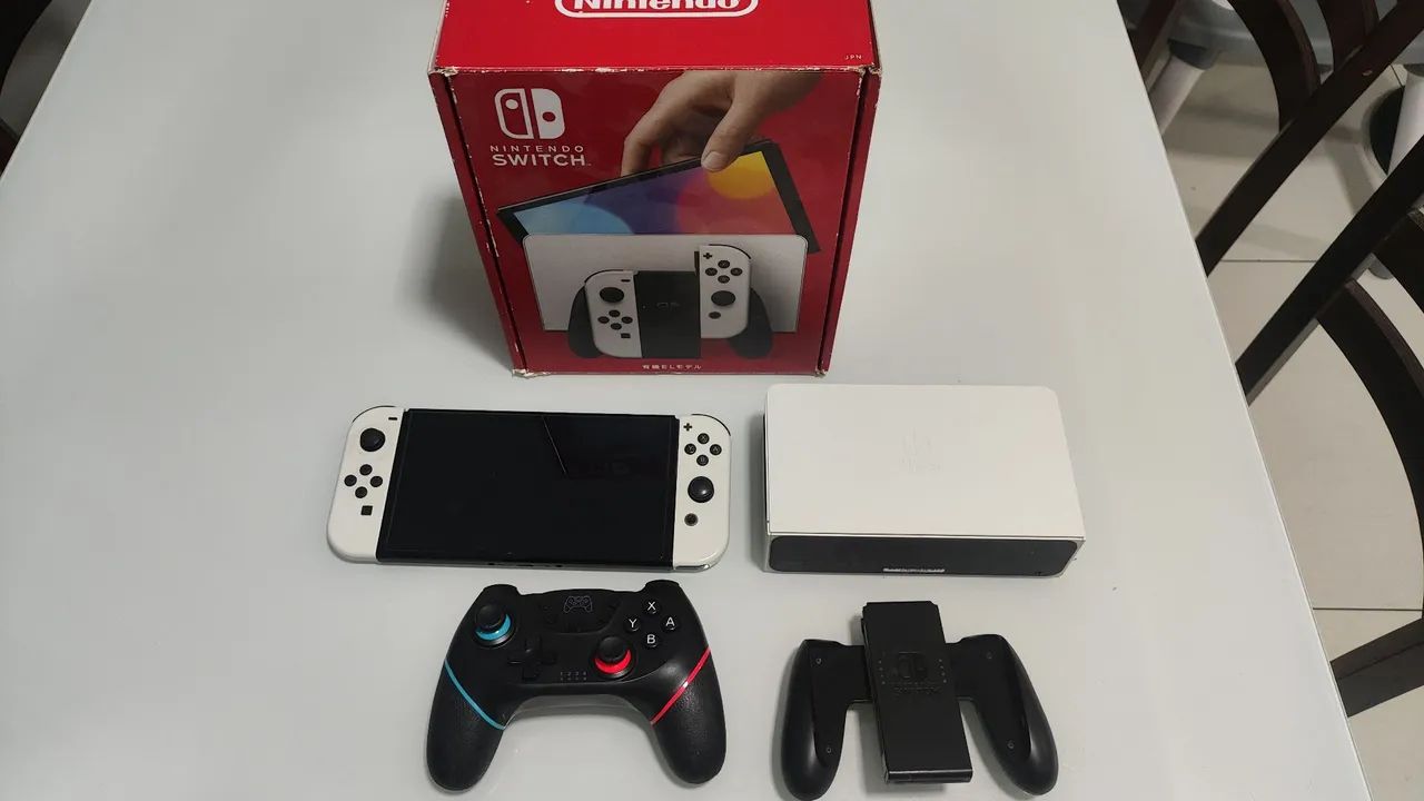 Nintendo Switch OLED 64 GB, completo e Bloqueado.  - Foto 2