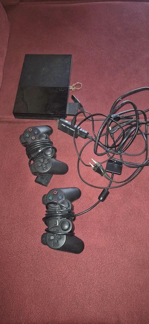 Ps2 n abri o jogo, pra conserto - Foto 3