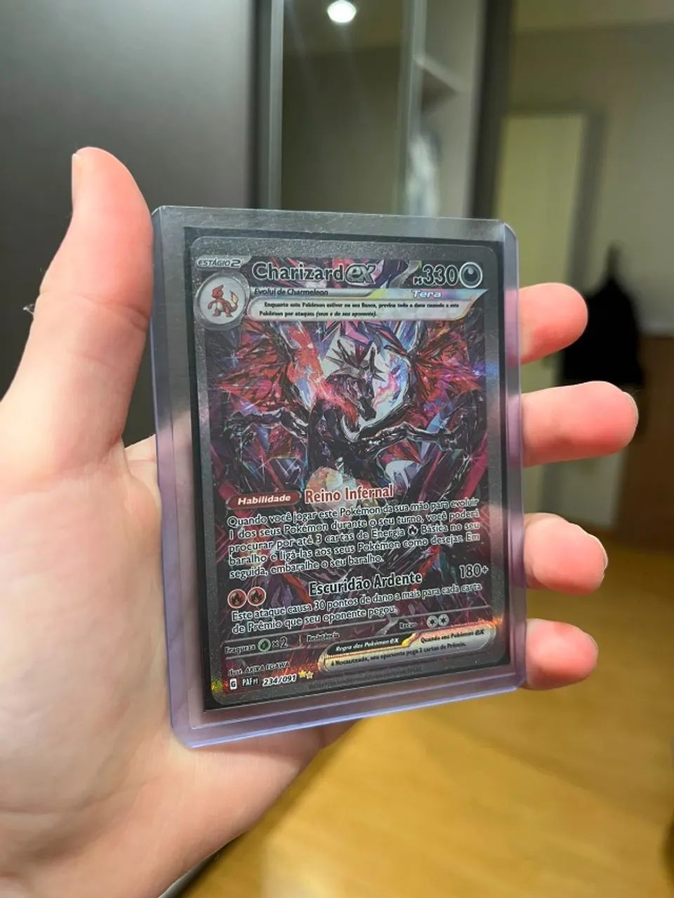 carta pokemon do chariard.(234/091)