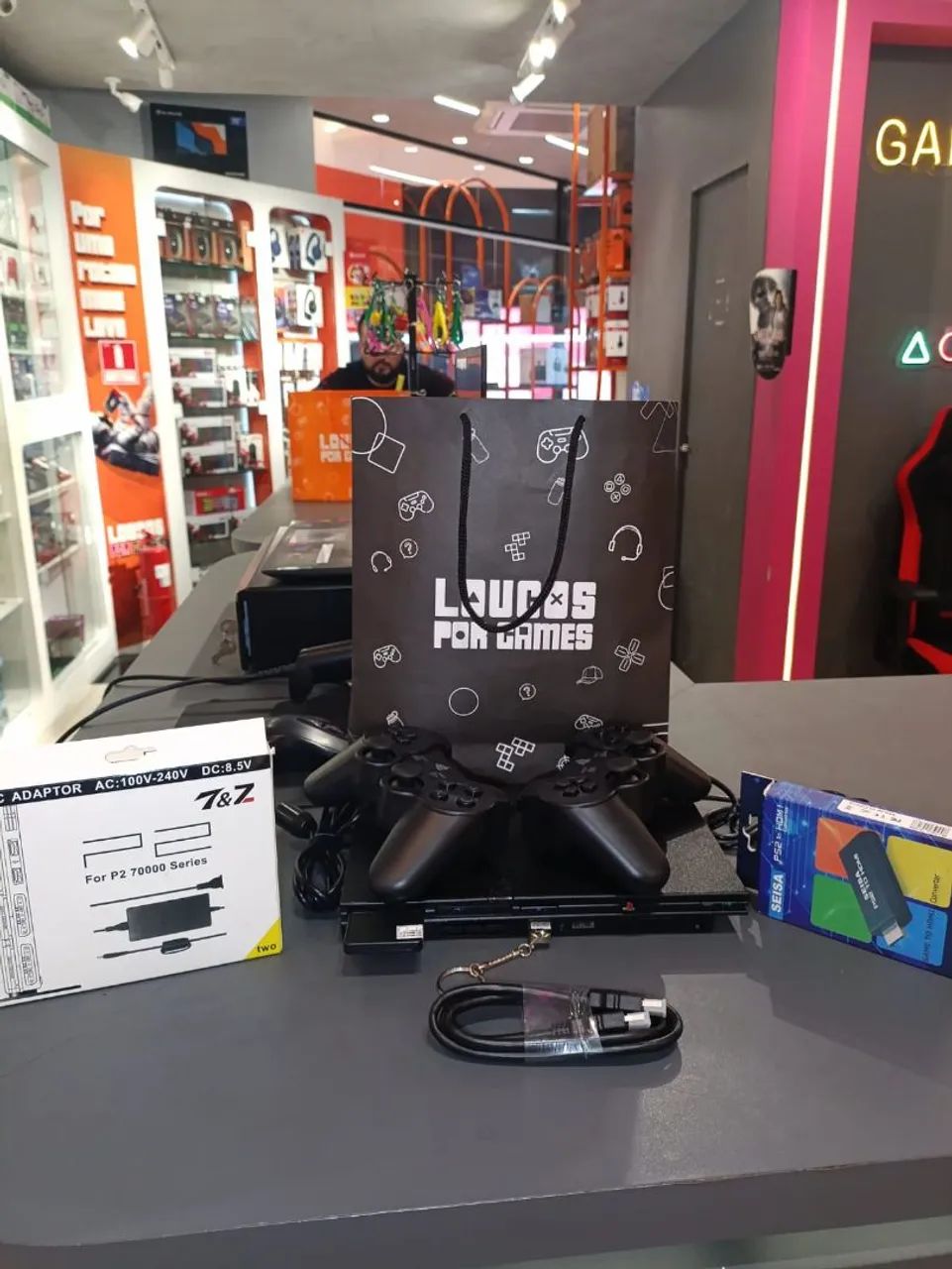 PS2 com garantia e vários jogos!