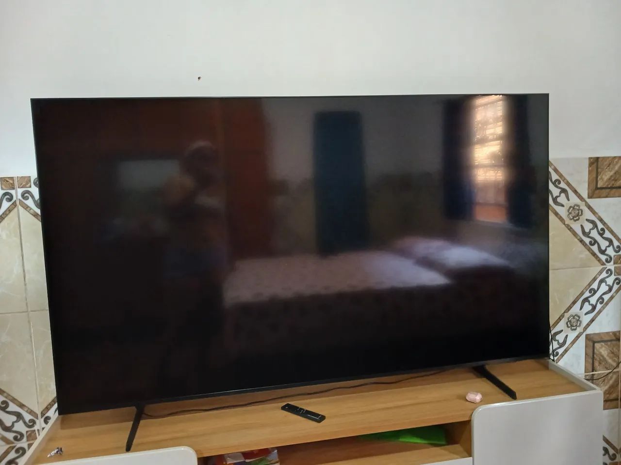 vendo TV 75' com raque 
