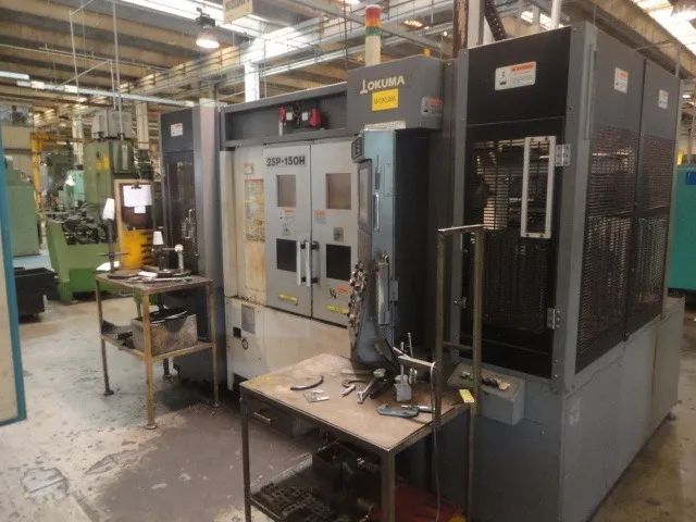 Centro de Torneamento CNC Okuma 2SP-150H robotizado,ano 2007